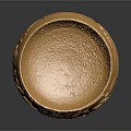 Golden Hand Carved Decorative Bowl With Intricate Patterns And Metallic Texture
