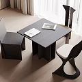 Modern Square Black Wooden Table And Designer Chairs Set With White Cushions In Bright Interior