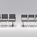 Row Of Modern Public Chairs With Metal Frame And Mesh Seats