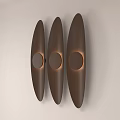 Three Oval Brown Wooden Wall Lights With Round Light Source On Light Wall 3d model