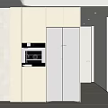Modern Kitchen Interior Featuring Light Colored Cabinets With Built in Oven And Refrigerator