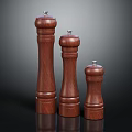 Three Wooden Pepper Grinders In Different Sizes For Kitchen Use 3d model