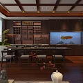 Chinese Style Office Interior Featuring Dark Wooden Furniture Fish Tank Tea Set And Green Plants