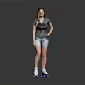 Woman standing in gray t-shirt and denim shorts with purple roller skates on reflective floor