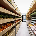 Fresh Fruit Store With Organized Shelves Displaying Oranges And Various Fruits