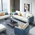 Modern White Blue Sofa Coffee Table Set With Ottoman Pillows Green Plants And Window View