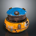 Worn Round Mechanical Object With Blue Top Yellow Base And Side Labels