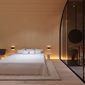 Cozy Hotel Guest Room Interior With Wooden Walls Arched Doorway Stone Wall Bathtub And Fireplace