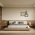Modern Bedroom With Beige Walls Wooden Bed Frame Wall Art And Round Mirror