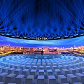 CENTEX Venue With Large Curved Screen Cityscape Blue Laser Beams White Seats Circular Arrangement