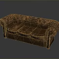 Vintage Brown Leather Sofa Featuring Quilted Design And Stitching Details
