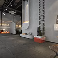 Hotpot Restaurant Modern Interior With Open Space Gray Walls Red Sculpture And Fireplace