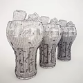Refreshing Chilled Coca Cola Bottles With Ice Cubes And Water Droplets