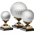 Three Transparent Spherical Trophies With Golden Base And Black Pedestal