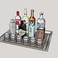 Various Alcohol Bottles And Glasses On Stylish Bar Tray With Shaker