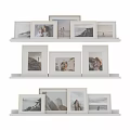 Minimalist Photo Frames With Scenery And People Photos On Shelf