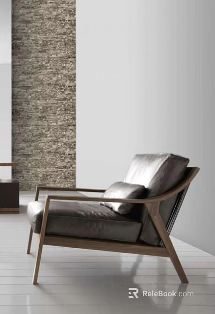 Modern Leather Single Sofa With Wooden Frame And Cushion Against Textured Wall 3d model 