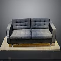 Gray Tufted Two Seater Sofa With Square Armrests Metal Legs On Light Colored Rug