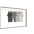 Row of Gray T-shirts Hanging On Wooden Hangers With Gradient Color From Dark To Light