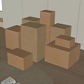 Various Sizes Corrugated Cardboard Boxes Stacked Neatly Arranged In Indoor Setting