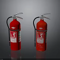 Two Red Fire Extinguishers With Silver Handles And Safety Labels On Black Surface