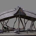 Natural Wooden Pavilion With Curved Tree like Pillars And Stone Bench Seats On Gravel Ground