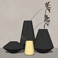 Textured Black And Cream Vases With Leafy Branch In Minimalist Interior