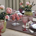Elegant Dinnerware Set with Pink Flowers Transparent Glassware Peaches Green Vases Red Glass Cups
