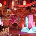 Chinese Style Banquet Hall With Red Decor Lanterns Flowers Chandeliers And Traditional Patterns