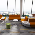 Modern Orange Sofas And White Coffee Tables By Floor To Ceiling Windows With City View 3d model