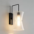 Modern Wall Lamp With Black Metal Bracket And Frosted Glass Shade Illuminated