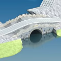 Stone Arch Bridge With Steps Connecting Stone Pavement Over Water And Green Area
