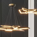 Modern Geometric Illuminated Chandelier With Sleek Metal Structure And Dark Wall Background