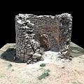 Ancient Stone Ruin Tower Surrounded by Desert Sand and Sparse Weeds Isolated on Black Background