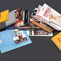 Various Colorful Books And Magazines With Assorted Covers Stacked And Scattered