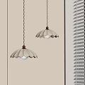 Beige Scalloped Pendant Lights With Wooden Details And Metal Chains Hanging By Light Colored Wall