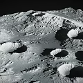 Rugged Lunar Surface Landscape Featuring Multiple Impact Craters and Rocky Terrain