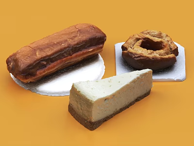 Delicious Chocolate Eclair Caramel Donut And New York Cheesecake Slice On Orange Background 3d model