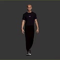 A Man in Black T-shirt And Black Pants Walking On Gray Background With White Sneakers