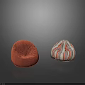 Two Different Bean Bag Chairs with Orange Velvety and Colorful Striped Designs