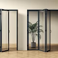 Modern Folding Doors With Black Frames Clear Glass And Green Plant In Interior