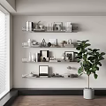 Wall Cabinets With Books Decorations Photo Frames And Green Plant In Modern Interior