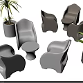 Modern Curved Leisure Chairs Featuring Simple Design Round Side Tables And Green Plants