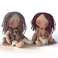 Two Handmade Dolls With Purple And Reddish Purple Hair Wearing Heart Pattern Dresses Sitting Together