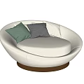 Beige Round Single Seater Sofa With Green Grey White Pillows And Gold Base