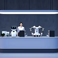 Exhibition Reception Desk With Female Receptionist Computer Robots Small Plant Gray Wall And Hanging Lamp