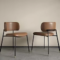 Modern Brown Leather Dining Chairs With Black Metal Legs And Sleek Design