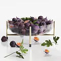 Fresh Purple Figs in Glass Bowl with Golden Stand and Sliced Fruits with Green Leaves