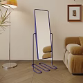 Purple Frame Mirror On Blue Stand In Living Room With Brown Sofa And Wooden Floor
