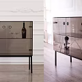 Modern Wine Cabinet Design With Glass Panels Black Metal Frame And Decorative Sculptures